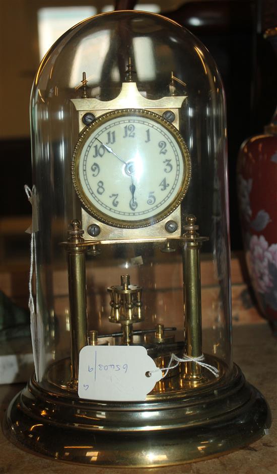 Brass anniversary clock under dome